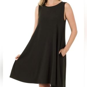 Zenana premium sleeveless black swing dress. Size small with pockets.